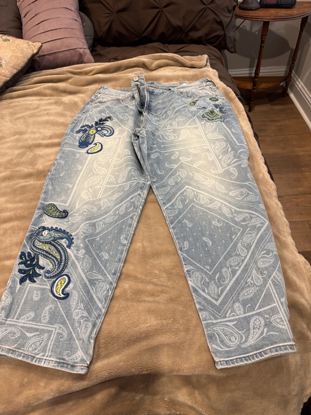 Chico's Light Wash Blue Paisley Embroidered Jeans. These are relaxed crops.